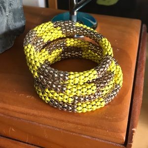Yellow metal bracelet.